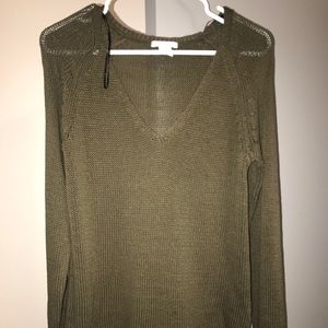 green v-neck sweater